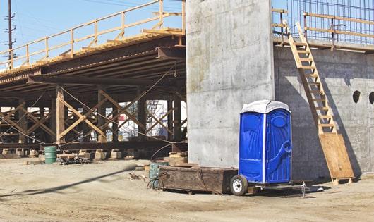 toilet rentals ready for use by construction crew